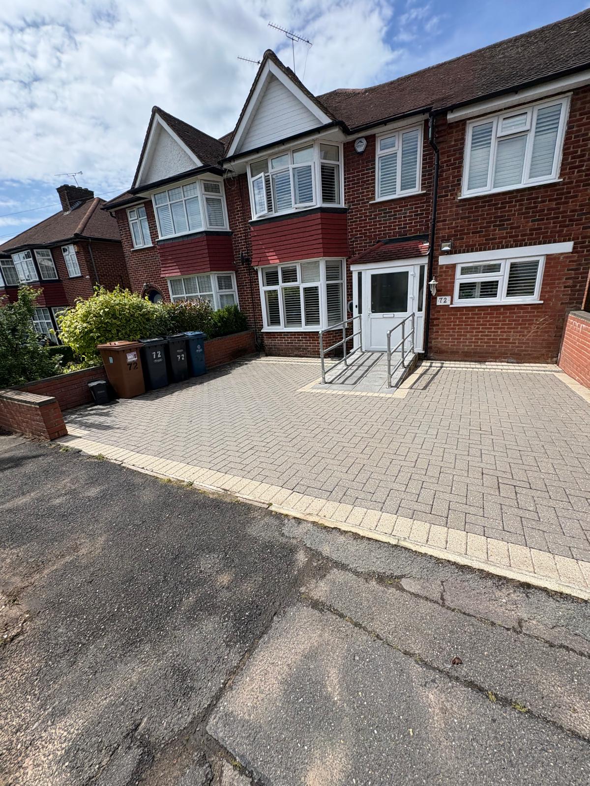 Cleaned block paving driveway with wheelchair ramp